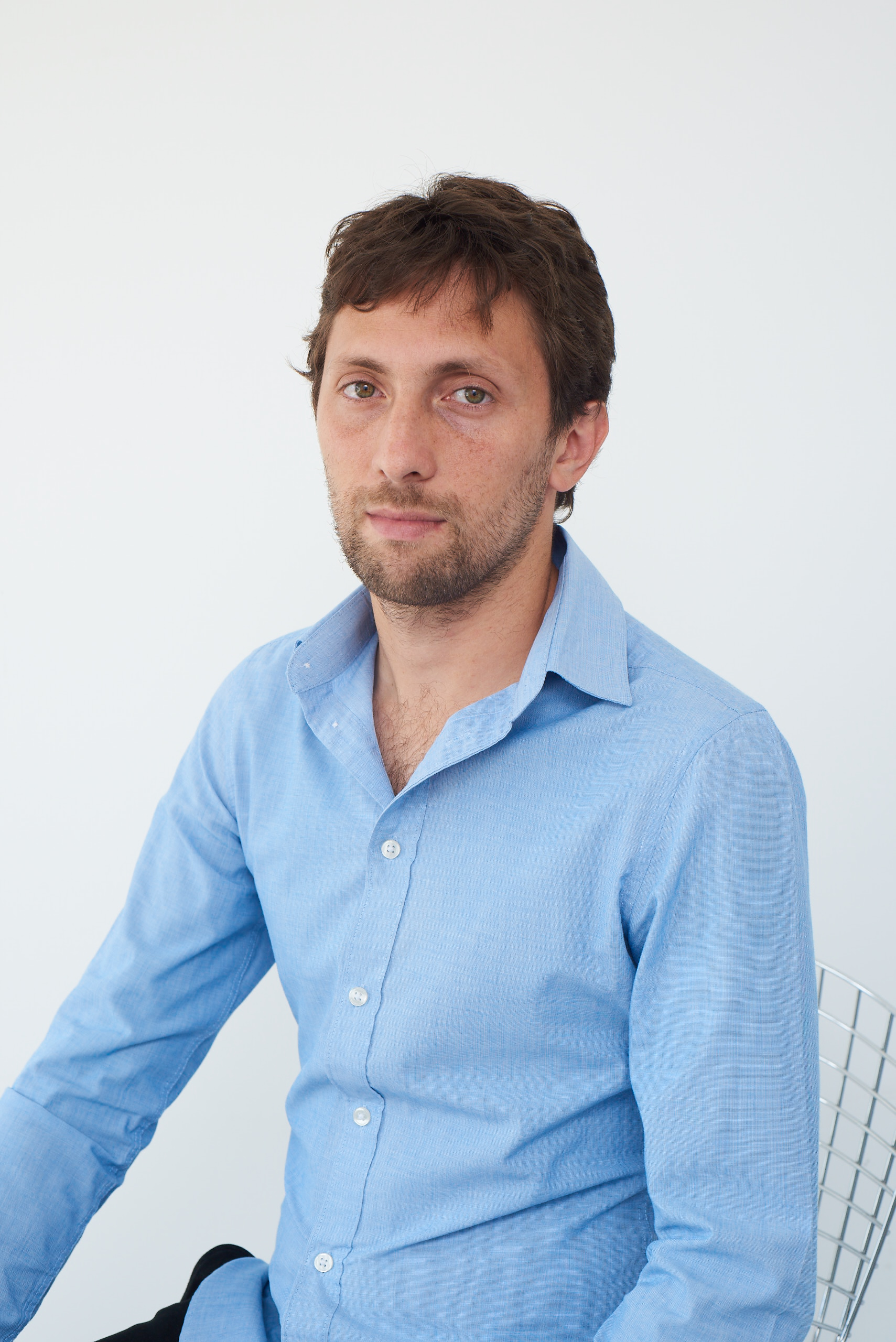 Gaston Krasny, AI and legaltech advisor, in a light blue shirt — corporate press photo